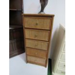 Rattan 5 drawer chest with glass top.