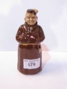 Brown ceramic monk/flask figurine. Estimate £10-20.
