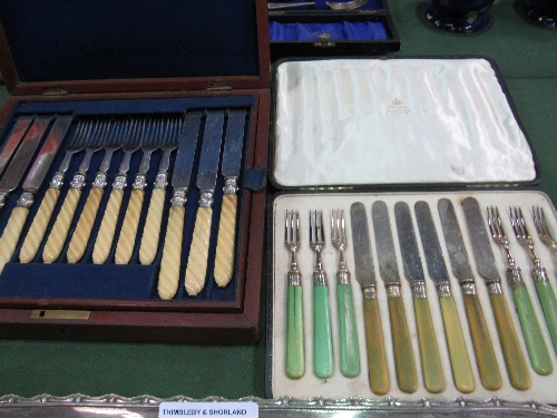 8 silver teaspoons, a pair of silver sugar tongs, canteen of bone handled fish knives & forks.