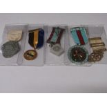 5 Masonic medals with ribbons.  Estimate £15-20.