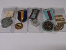 5 Masonic medals with ribbons.  Estimate £15-20.