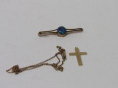 9ct gold crucifix & fine chain, 2.6gms & opal set tie pin. Estimate £20-30.