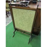 Mahogany tapestry fire screen, 58cms width x 98cms height. Estimate £20-30.