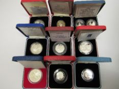 19 UK Royal Mint cased sterling proof coins & medals covering period 1979-2006. Estimate £250-350.