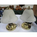 Pair of bedside lamps with opaque glass bell shades. Estimate £5-10.