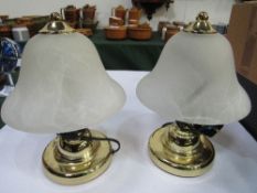 Pair of bedside lamps with opaque glass bell shades. Estimate £5-10.