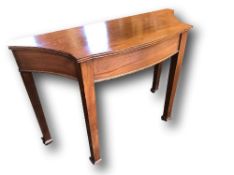 Mahogany console table with scalloped sides, 115cms x 79cms x 44cms. Estimate £20-30.