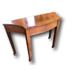 Mahogany console table with scalloped sides, 115cms x 79cms x 44cms. Estimate £20-30.