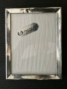 Silver picture frame.  Estimate £20-30.