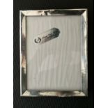 Silver picture frame.  Estimate £20-30.