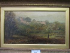 Gilt framed picture on card of countryside scene with church. Estimate £20-30.