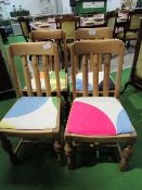 4 oak drop-in seat rail back dining chairs. Estimate £15-25.