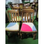 4 oak drop-in seat rail back dining chairs. Estimate £15-25.