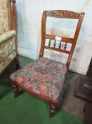 Nursing chair with carved rail & turned splat. Estimate £10-20.