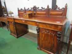 Very large mahogany sideboard with 4 frieze drawers over 2 cupboards to either side & carved back