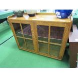 Oak cabinet with 4 panel glass doors. Estimate £10-20.