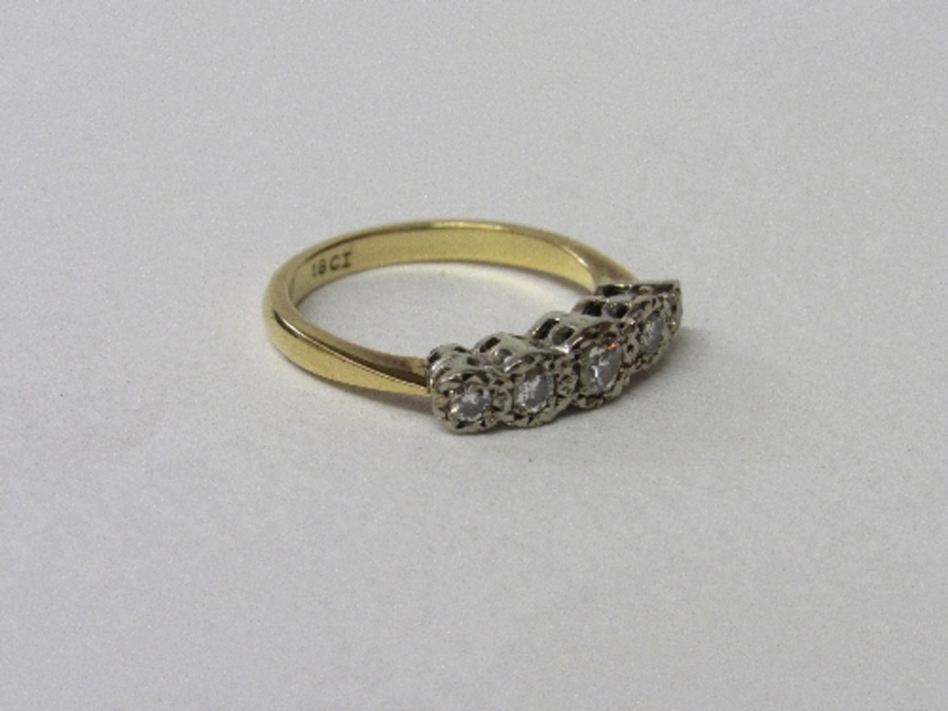 18ct gold 5 stone diamond ring, size L, wt 3.6gms. Estimate £180-200.