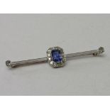 Diamond & blue stone bar brooch. Estimate £30-50.
