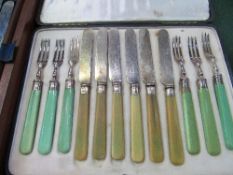 Box of bone handled knives & forks & an Asprey set of bone handled fruit knives & forks. Estimate £