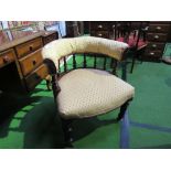 Gold upholstered Captain's spindle back chair, on castors. Estimate £30-50.