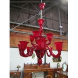 Red Murano glass chandelier by Cristalstrass. Estimate £100-200.