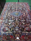 Red Persian-style carpet, 1.5m x 2.3m