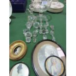 Etched glass bowl, collection of 12 glass decanter stoppers, glass decanter & 4 miniature portraits.