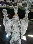2 cut glass Waterford decanters, another decanter & a Tyrone cut glass bonbon dish. Est. £20-30.