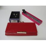 New red purse in box, an M&S necklace & earring set & a Buckingham bracelet. Estimate £8-12.