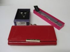 New red purse in box, an M&S necklace & earring set & a Buckingham bracelet. Estimate £8-12.