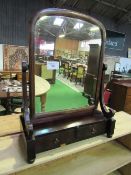 Dome top Edwardian mahogany dressing table mirror with twin drawers. Estimate £10-30.