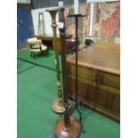 3 lamp standards - 2 wooden & 1 metal. Estimate £20-30.