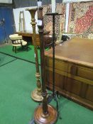 3 lamp standards - 2 wooden & 1 metal. Estimate £20-30.