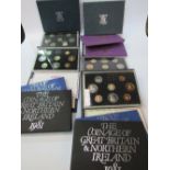 12 Royal Mint UK annual set proof coins: 2x 1980 to 1984, 1x 1985 & 1x 1986. Estimate £40-80.