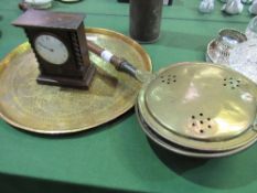 Brass bed warmer, an Indian brass charger, a brass shell case & an oak cased mantle clock.