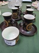 A set of 6 Denby arabesque coffee cups & saucers (chips to one) & a matching sugar bowl. Estimate £