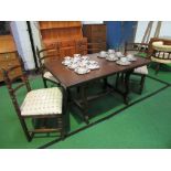 An oak extending dining table, 137cms x 74cms x 84cms with 4 matching chairs by Younger. Estimate £