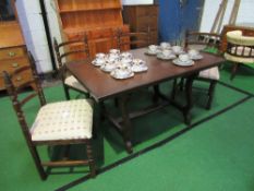 An oak extending dining table, 137cms x 74cms x 84cms with 4 matching chairs by Younger. Estimate £