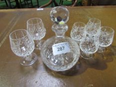 Crystal decanter & 6 brandy glasses. Estimate £20-30.