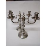 A pair of silver single/two branch candelabrum by J A Campbell, London 1978/79. Estimate £100-150.