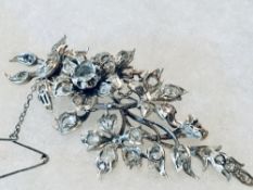 An impressive Austro-Hungarian floral diamond & white gold brooch of 41 old cut diamonds set