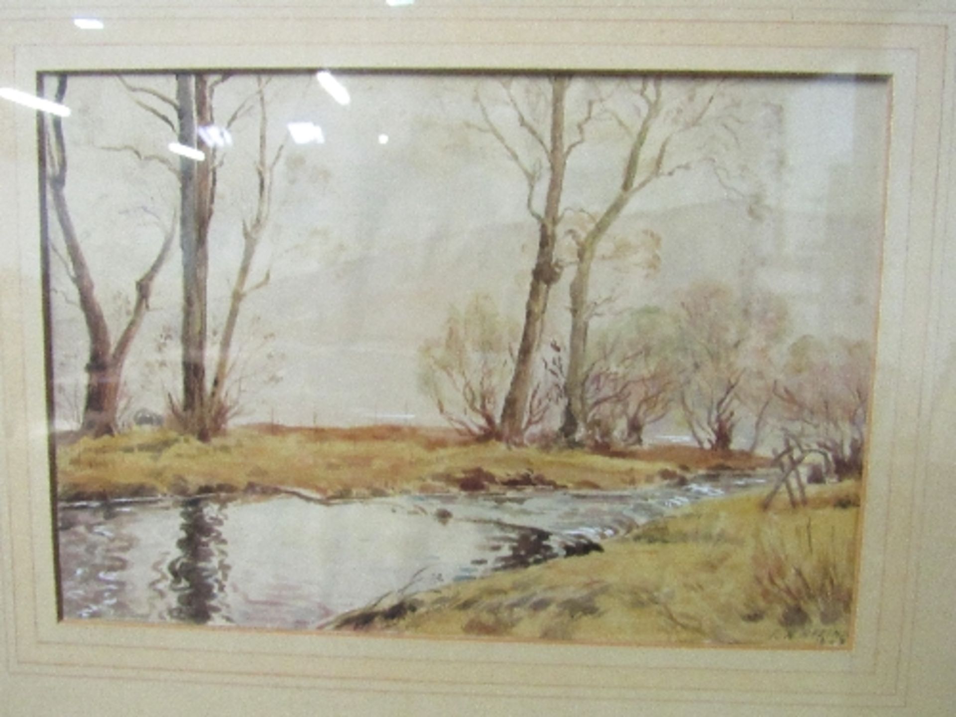 Framed & glazed watercolour of a river scene signed R A Atkins 1847. Estimate £10-20.