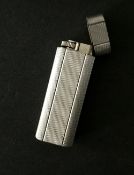 Vintage Cartier silver plated lighter.  In working order, without flint.  Estimate £40-50.