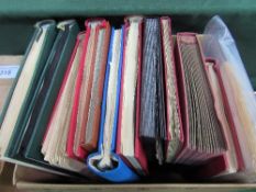 Box of stamps in 11 albums & 1,000 sheets. Estimate £45-50.