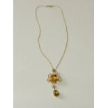 9ct gold & amber pendant in filigree setting, largest stone is 10mm x 14mm & smaller stone is 8mm