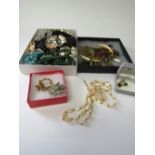 2 boxes of various costume jewellery. Estimate £10-20.