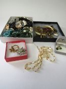 2 boxes of various costume jewellery. Estimate £10-20.