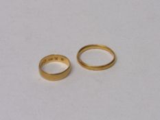 2x 22ct gold wedding bands, size I 1/2 & P, total weight 6.5gms. Estimate £180-200.