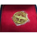 18 carat gold Battle of Britain commemorative medal with certificate. Estimate £180-220.