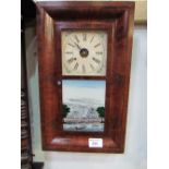 Mahogany cased American wall clock by Seth Thomas with key, weight & pendulum. Estimate £20-30.